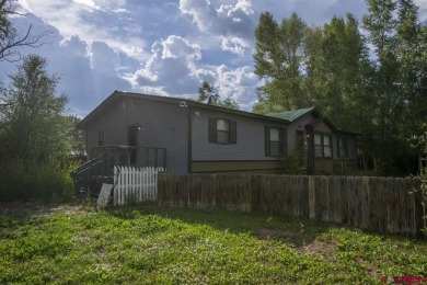 Sigrid Cottrell, Crested Butte Realty Company, C: , sigrid,  : on Dos Rios Golf Course in Colorado - for sale on GolfHomes.com, golf home, golf lot