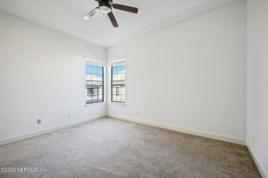 Stunning Townhome nestled in the center of  Palencia Golf on The Palencia Club in Florida - for sale on GolfHomes.com, golf home, golf lot