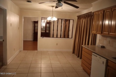 FANTASTIC HOME IN SOUTH PASCAGOULA JUST MINUTES FROM THE on Pascagoula Country Club in Mississippi - for sale on GolfHomes.com, golf home, golf lot