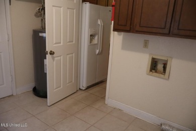 FANTASTIC HOME IN SOUTH PASCAGOULA JUST MINUTES FROM THE on Pascagoula Country Club in Mississippi - for sale on GolfHomes.com, golf home, golf lot
