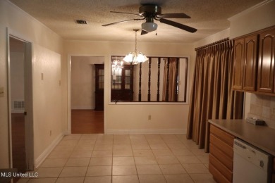 FANTASTIC HOME IN SOUTH PASCAGOULA JUST MINUTES FROM THE on Pascagoula Country Club in Mississippi - for sale on GolfHomes.com, golf home, golf lot