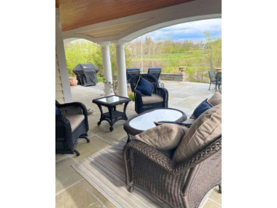 Indulge in the pinnacle of elegance and serenity with this on Bay Harbor Golf Club in Michigan - for sale on GolfHomes.com, golf home, golf lot
