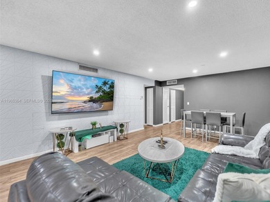 Experience elevated living in this beautifully 2-bedroom, 2-bath on Inverrary Country Club in Florida - for sale on GolfHomes.com, golf home, golf lot