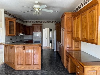 Beautiful one level traditional style home nestled on a private on Coronado Golf Course in Arkansas - for sale on GolfHomes.com, golf home, golf lot