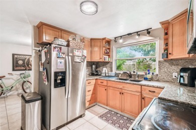 This stunning ranch-style home in beautiful Forest Hills offers on Babe Zaharias Golf Course in Florida - for sale on GolfHomes.com, golf home, golf lot