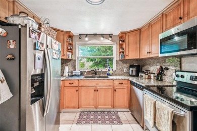 This stunning ranch-style home in beautiful Forest Hills offers on Babe Zaharias Golf Course in Florida - for sale on GolfHomes.com, golf home, golf lot