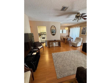 Under contract-accepting backup offers. Welcome to this fully on Kings Point Executive Golf Course in Florida - for sale on GolfHomes.com, golf home, golf lot