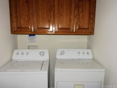 Beautiful one level traditional style home nestled on a private on Coronado Golf Course in Arkansas - for sale on GolfHomes.com, golf home, golf lot