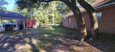 If you are looking for a 4-bedroom house with a large parking on Lake Forest Yacht and Country Club in Alabama - for sale on GolfHomes.com, golf home, golf lot