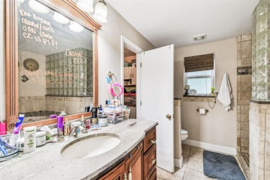 This stunning ranch-style home in beautiful Forest Hills offers on Babe Zaharias Golf Course in Florida - for sale on GolfHomes.com, golf home, golf lot