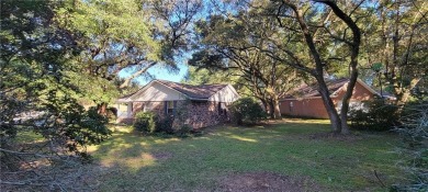 If you are looking for a 4-bedroom house with a large parking on Lake Forest Yacht and Country Club in Alabama - for sale on GolfHomes.com, golf home, golf lot
