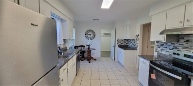 If you are looking for a 4-bedroom house with a large parking on Lake Forest Yacht and Country Club in Alabama - for sale on GolfHomes.com, golf home, golf lot