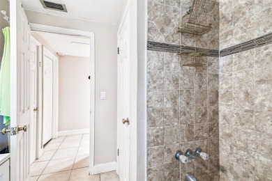 This stunning ranch-style home in beautiful Forest Hills offers on Babe Zaharias Golf Course in Florida - for sale on GolfHomes.com, golf home, golf lot