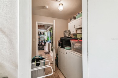 This stunning ranch-style home in beautiful Forest Hills offers on Babe Zaharias Golf Course in Florida - for sale on GolfHomes.com, golf home, golf lot