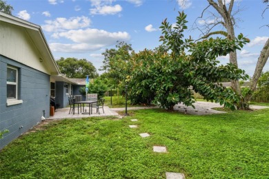 This stunning ranch-style home in beautiful Forest Hills offers on Babe Zaharias Golf Course in Florida - for sale on GolfHomes.com, golf home, golf lot