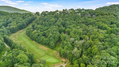 Nestled in Wolf Laurel, a 5,300-acre gated community surrounded on Wolf Laurel Country Club in North Carolina - for sale on GolfHomes.com, golf home, golf lot