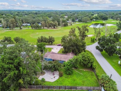 This stunning ranch-style home in beautiful Forest Hills offers on Babe Zaharias Golf Course in Florida - for sale on GolfHomes.com, golf home, golf lot