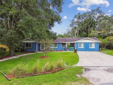 This stunning ranch-style home in beautiful Forest Hills offers on Babe Zaharias Golf Course in Florida - for sale on GolfHomes.com, golf home, golf lot