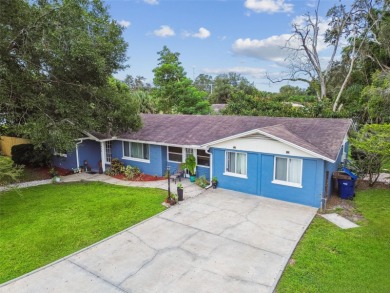 This stunning ranch-style home in beautiful Forest Hills offers on Babe Zaharias Golf Course in Florida - for sale on GolfHomes.com, golf home, golf lot