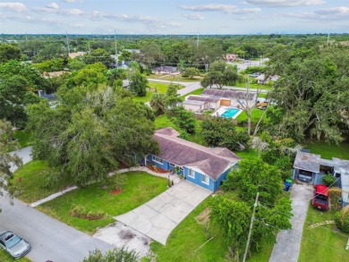 This stunning ranch-style home in beautiful Forest Hills offers on Babe Zaharias Golf Course in Florida - for sale on GolfHomes.com, golf home, golf lot