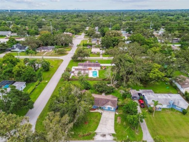 This stunning ranch-style home in beautiful Forest Hills offers on Babe Zaharias Golf Course in Florida - for sale on GolfHomes.com, golf home, golf lot