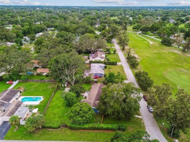 This stunning ranch-style home in beautiful Forest Hills offers on Babe Zaharias Golf Course in Florida - for sale on GolfHomes.com, golf home, golf lot