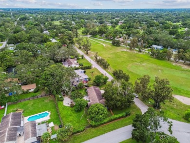 This stunning ranch-style home in beautiful Forest Hills offers on Babe Zaharias Golf Course in Florida - for sale on GolfHomes.com, golf home, golf lot
