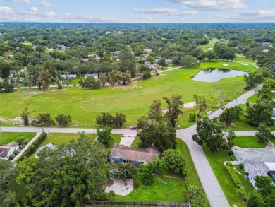 This stunning ranch-style home in beautiful Forest Hills offers on Babe Zaharias Golf Course in Florida - for sale on GolfHomes.com, golf home, golf lot