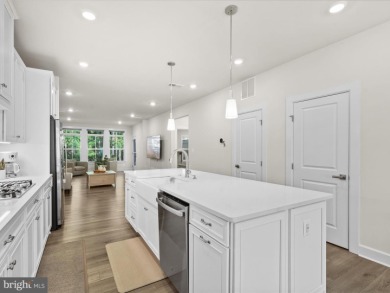 Welcome to 22198 Dune Circle, a gracious townhome villa offering on The Peninsula Golf and Country Club in Delaware - for sale on GolfHomes.com, golf home, golf lot