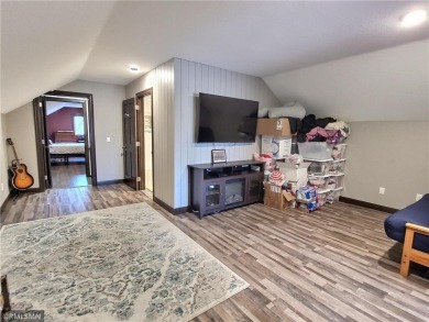 Tucked away in the woods on a spacious 1.8-acre lot, this modern on Whispering Pines Golf Club in Minnesota - for sale on GolfHomes.com, golf home, golf lot