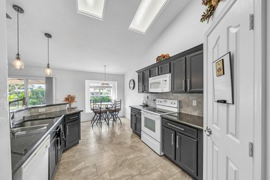 Built in 2004 with sturdy CBS construction, this spacious on  in Florida - for sale on GolfHomes.com, golf home, golf lot