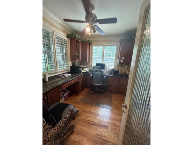 Absolutely stunning home in the prestigious Eagles Landing on Eagles Landing Country Club in Georgia - for sale on GolfHomes.com, golf home, golf lot