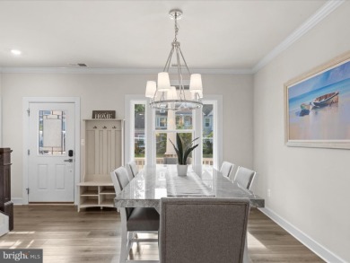 Welcome to 22198 Dune Circle, a gracious townhome villa offering on The Peninsula Golf and Country Club in Delaware - for sale on GolfHomes.com, golf home, golf lot