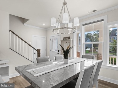Welcome to 22198 Dune Circle, a gracious townhome villa offering on The Peninsula Golf and Country Club in Delaware - for sale on GolfHomes.com, golf home, golf lot