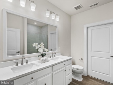 Welcome to 22198 Dune Circle, a gracious townhome villa offering on The Peninsula Golf and Country Club in Delaware - for sale on GolfHomes.com, golf home, golf lot