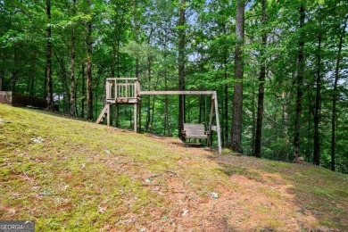 Welcome to 100 Oboe Court - Your Private Mountain Retreat in the on White Path Golf Club in Georgia - for sale on GolfHomes.com, golf home, golf lot