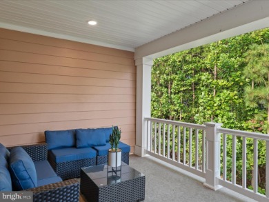 Welcome to 22198 Dune Circle, a gracious townhome villa offering on The Peninsula Golf and Country Club in Delaware - for sale on GolfHomes.com, golf home, golf lot