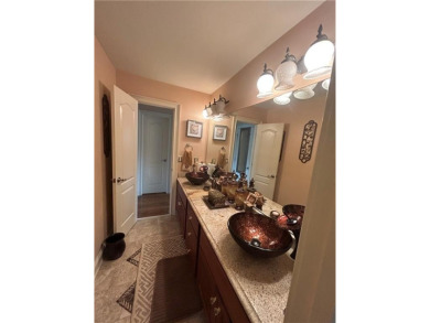Absolutely stunning home in the prestigious Eagles Landing on Eagles Landing Country Club in Georgia - for sale on GolfHomes.com, golf home, golf lot
