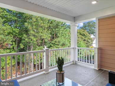 Welcome to 22198 Dune Circle, a gracious townhome villa offering on The Peninsula Golf and Country Club in Delaware - for sale on GolfHomes.com, golf home, golf lot