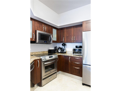 Spacious 2-bedroom, 2-bath residence located in Turnberry on Turnberry Isle Resort and Club in Florida - for sale on GolfHomes.com, golf home, golf lot