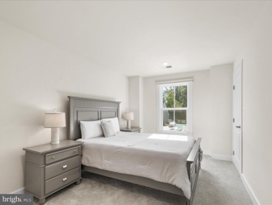 Welcome to 22198 Dune Circle, a gracious townhome villa offering on The Peninsula Golf and Country Club in Delaware - for sale on GolfHomes.com, golf home, golf lot