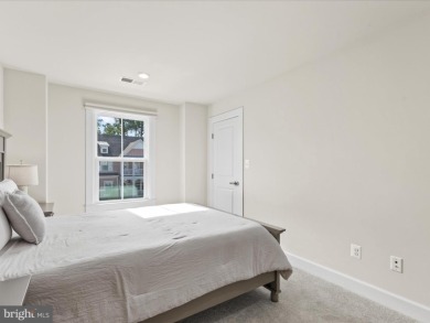 Welcome to 22198 Dune Circle, a gracious townhome villa offering on The Peninsula Golf and Country Club in Delaware - for sale on GolfHomes.com, golf home, golf lot