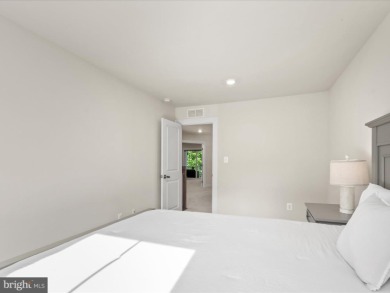 Welcome to 22198 Dune Circle, a gracious townhome villa offering on The Peninsula Golf and Country Club in Delaware - for sale on GolfHomes.com, golf home, golf lot