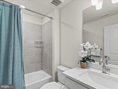 Welcome to 22198 Dune Circle, a gracious townhome villa offering on The Peninsula Golf and Country Club in Delaware - for sale on GolfHomes.com, golf home, golf lot