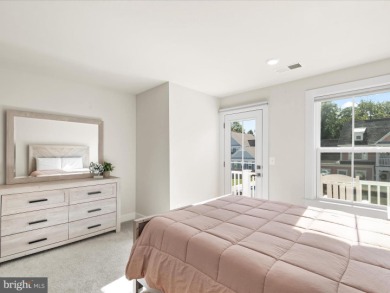 Welcome to 22198 Dune Circle, a gracious townhome villa offering on The Peninsula Golf and Country Club in Delaware - for sale on GolfHomes.com, golf home, golf lot