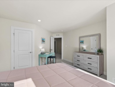 Welcome to 22198 Dune Circle, a gracious townhome villa offering on The Peninsula Golf and Country Club in Delaware - for sale on GolfHomes.com, golf home, golf lot