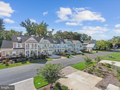 Welcome to 22198 Dune Circle, a gracious townhome villa offering on The Peninsula Golf and Country Club in Delaware - for sale on GolfHomes.com, golf home, golf lot
