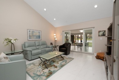 Discover an impeccable, fully renovated 2BR/2BA waterfront villa on Boca Lago Golf and Country Club in Florida - for sale on GolfHomes.com, golf home, golf lot