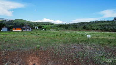 Bring your own builder to this spacious 0.48-acre homesite in on Council Mountain Golf Course in Idaho - for sale on GolfHomes.com, golf home, golf lot