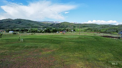 Bring your own builder to this spacious 0.48-acre homesite in on Council Mountain Golf Course in Idaho - for sale on GolfHomes.com, golf home, golf lot